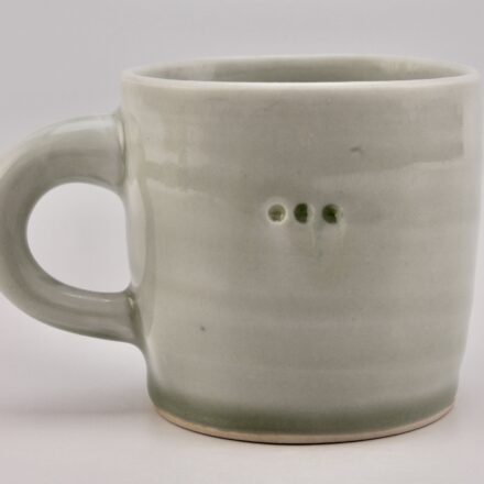 C1327: Main image for Small Celadon mug with three dots made by Peter Beasecker